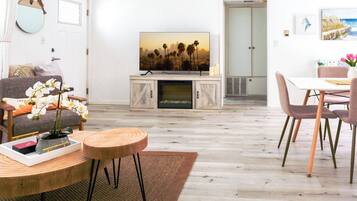 Smart TV, fireplace, books