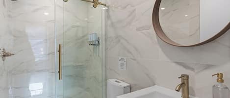 Shower, hair dryer, towels, soap