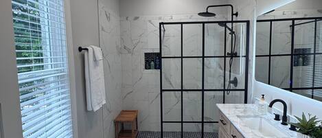 Shower, towels, soap, toilet paper