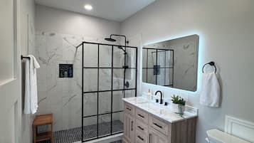 Shower, towels, soap, toilet paper