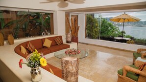 Living area - Zihua Vista Bay Principal: Stunning La Ropa Views, Infinity Pool & Gourmet Kitch (Zihuatanejo)