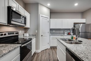 Fridge, microwave, oven, stovetop - Close Drive to Wichita Hoops. Garage Parking + W&D (Bel Aire)