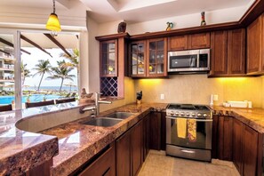 Fridge, microwave, oven, stovetop - Poolfront Paradise with Ocean View - 2BR 2BA Condo: Puerto Escondido Vivo Resort (Bajos de Chila)