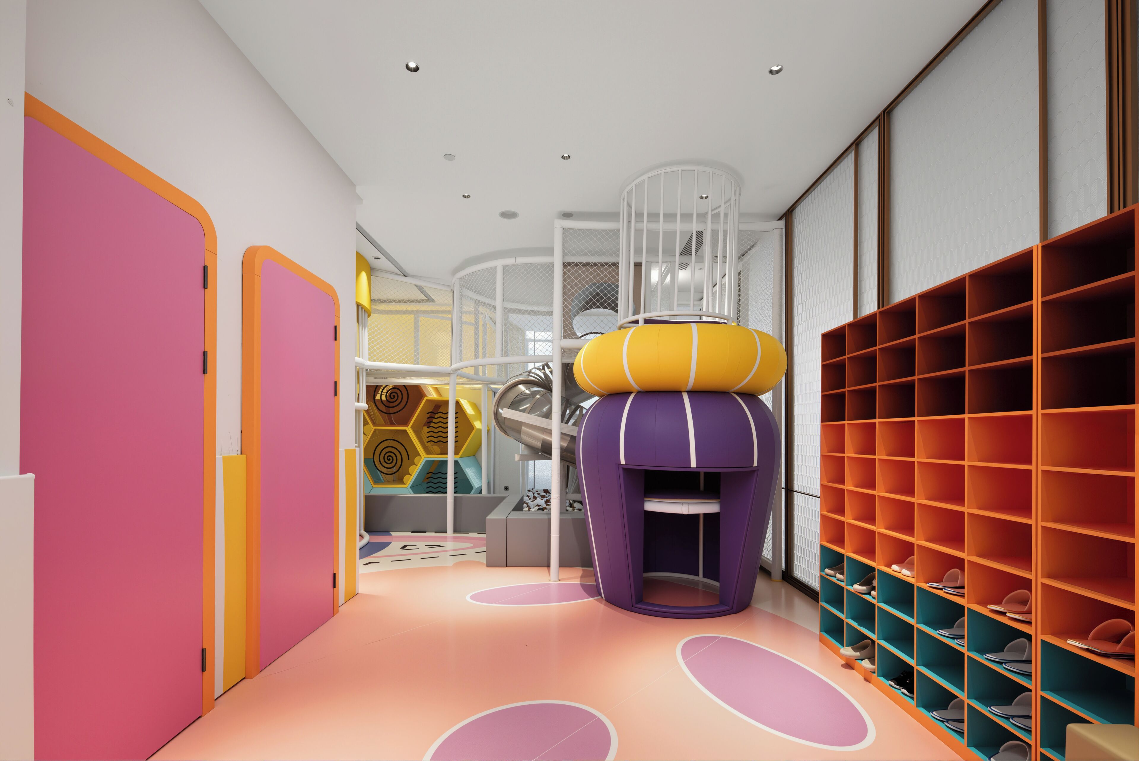 A children's play area with colorful walls, a slide, and a play structure.
