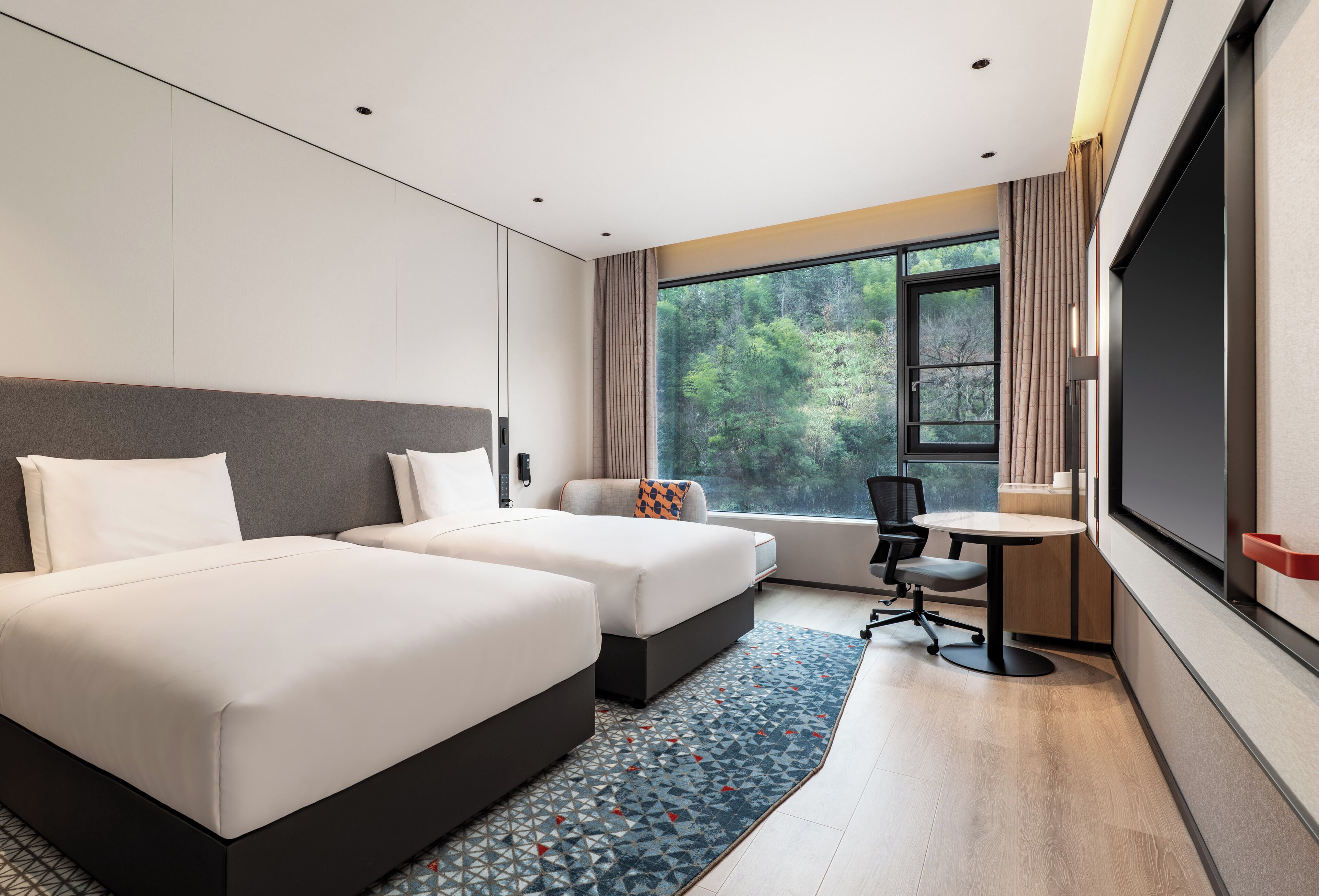 2 Single Standard Extra Floor Space | Premium bedding, down comforters, desk, laptop workspace