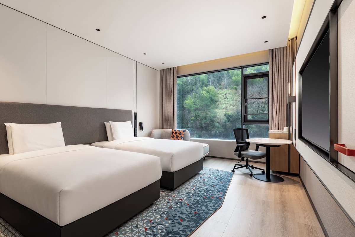 2 Single Standard Extra Floor Space | Premium bedding, down comforters, desk, laptop workspace
