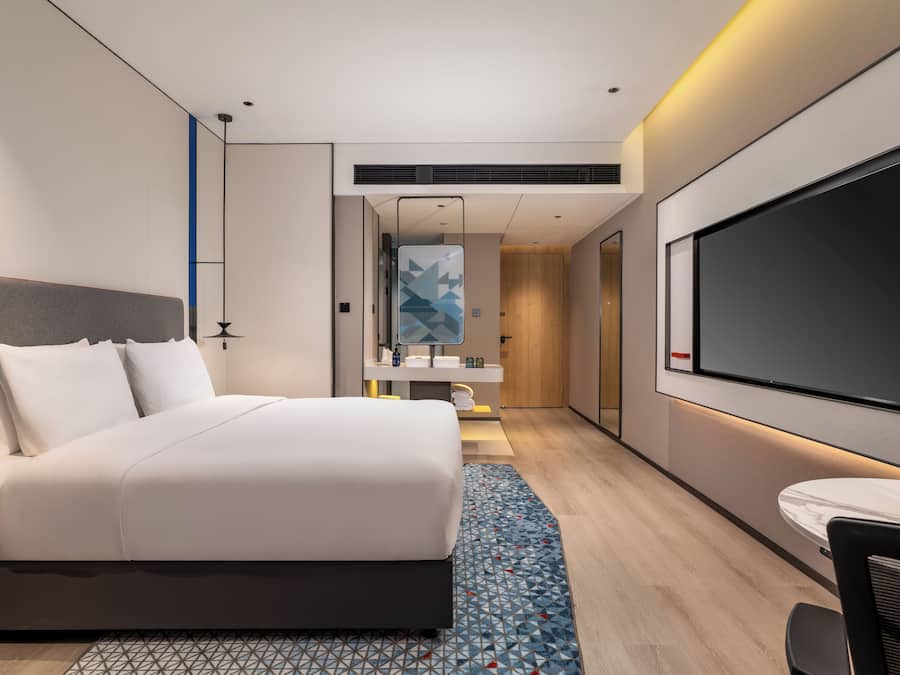 1 King Standard Extra Floor Space | Premium bedding, down comforters, desk, laptop workspace