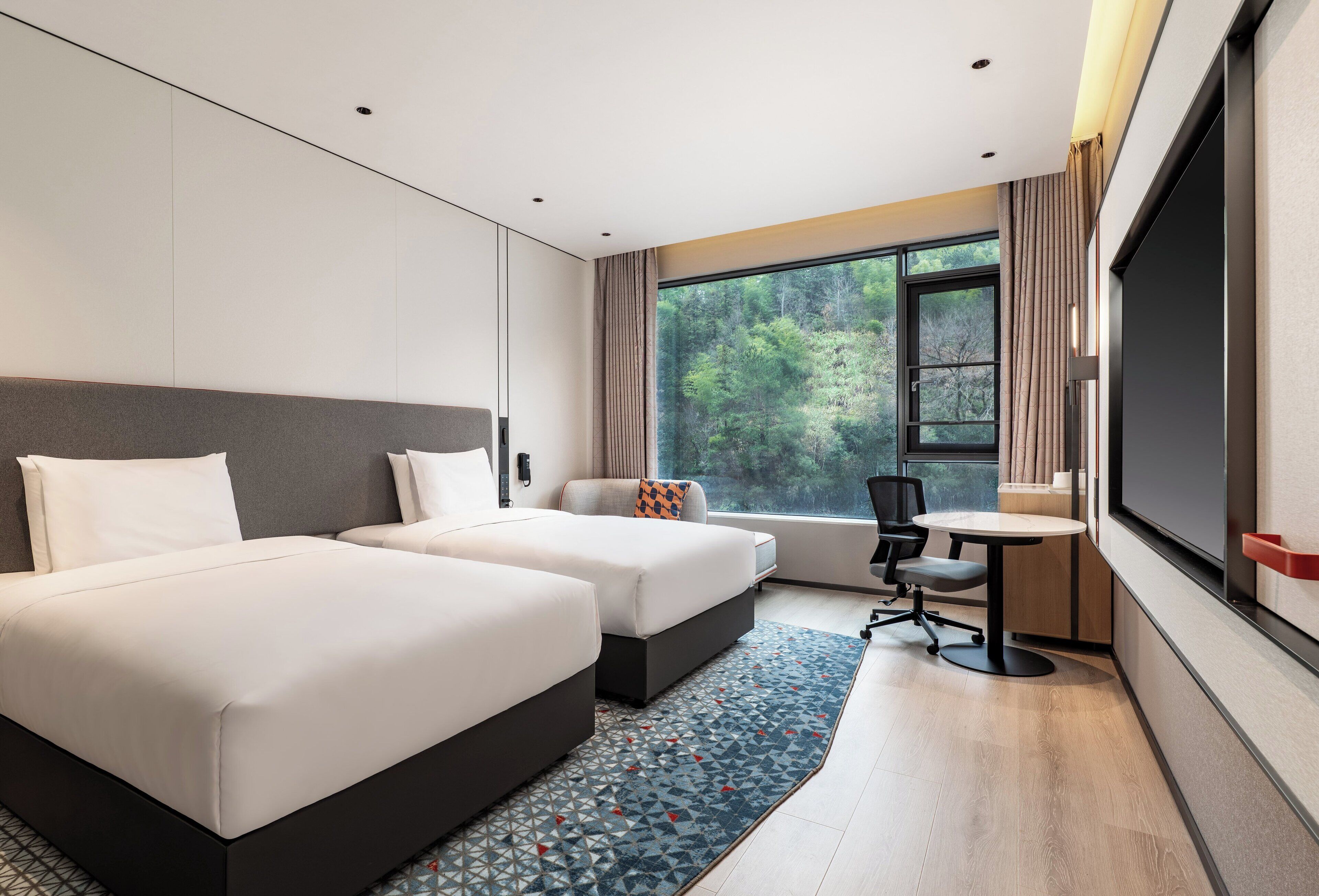 Premium bedding, down duvets, desk, laptop workspace