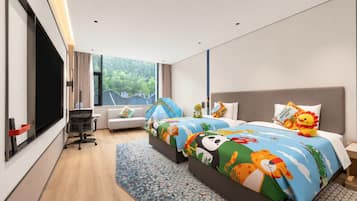 A modern hotel room with a large bed, a desk, a chair, and a TV.