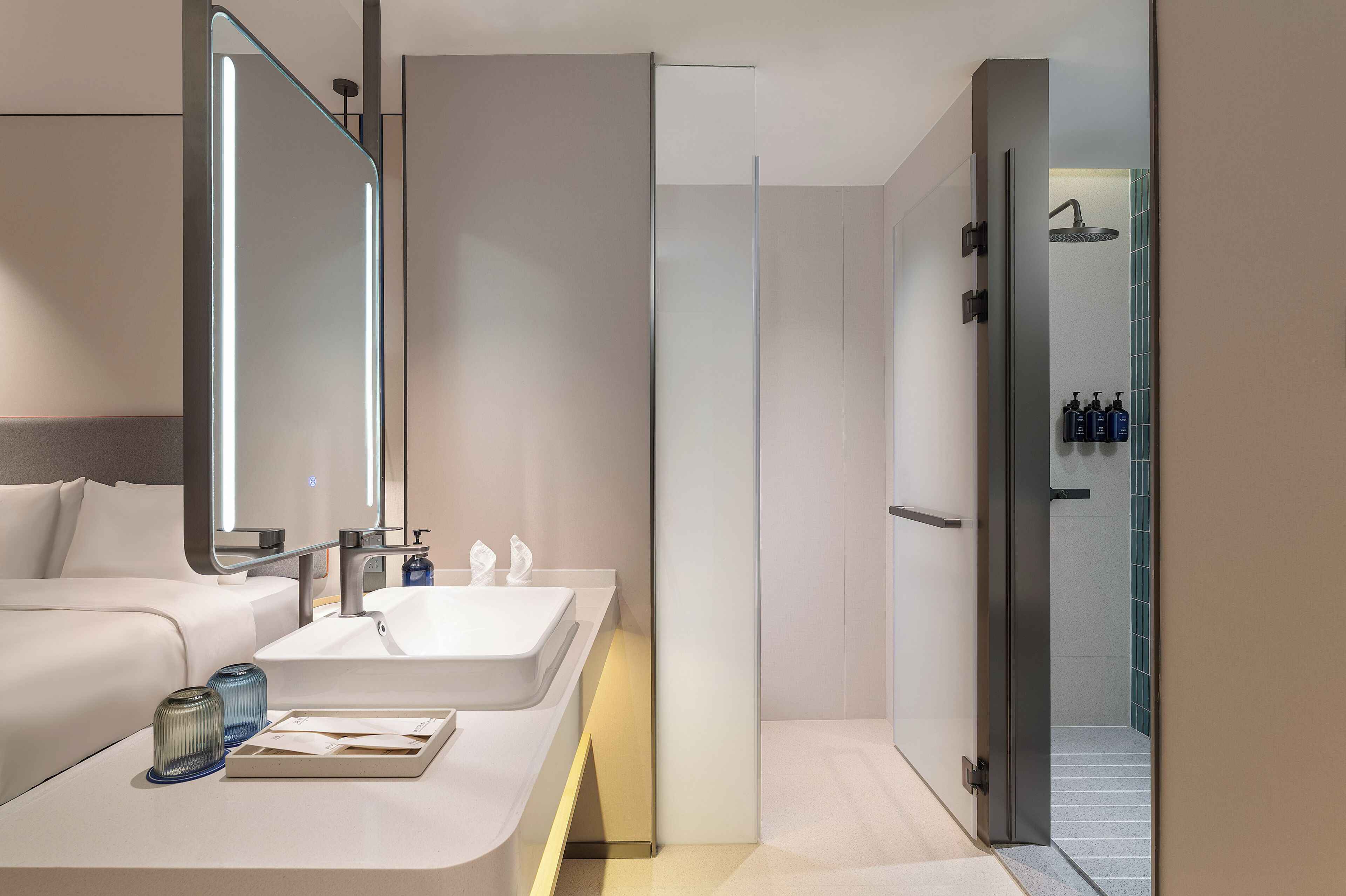 Shower, designer toiletries, hair dryer, slippers
