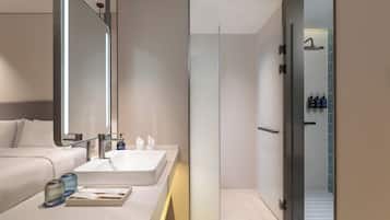 Shower, designer toiletries, hair dryer, slippers