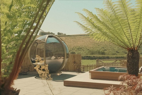 Relax and unwind in the beautiful hot tub garden, pre-book private sessions for no extra fee