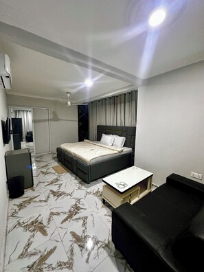 Deluxe Double Room Single Use, Balcony, Pool View | Iron/ironing board, free WiFi - Northwold Hotel-Pokuase Interchange ACC (Kwabenya)