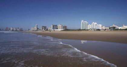 Beautiful apartment with AC in vibrant Durban in secured complex with pool.