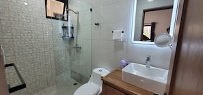 Shower, towels, soap, toilet paper