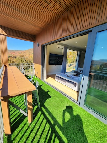 Outdoor dining. Modern Catskills Mountain Retreat with Rooftop Hot Tub on 22 Private Acres