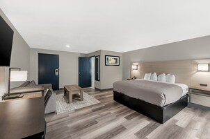 开间套房 | 高档床上用品、办公桌、笔记本电脑工作区、遮光窗帘