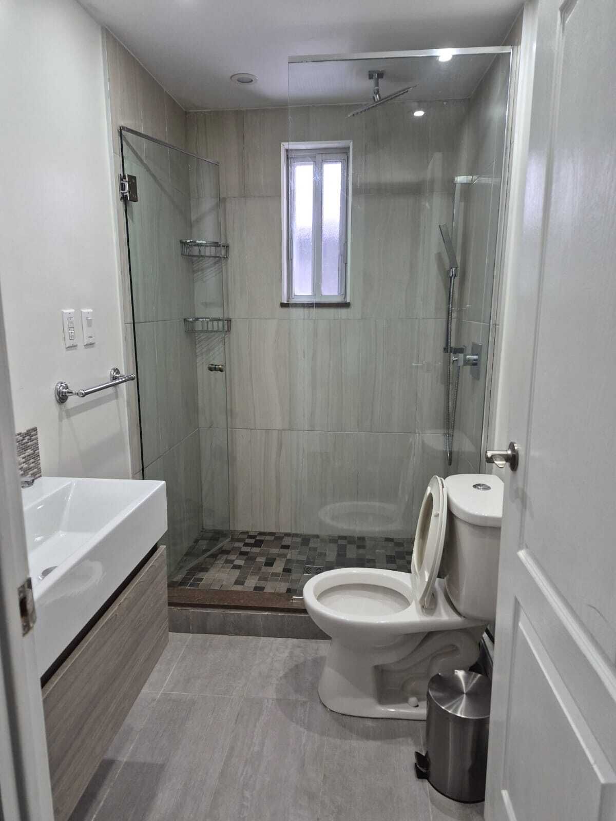 Shower, towels, soap, toilet paper
