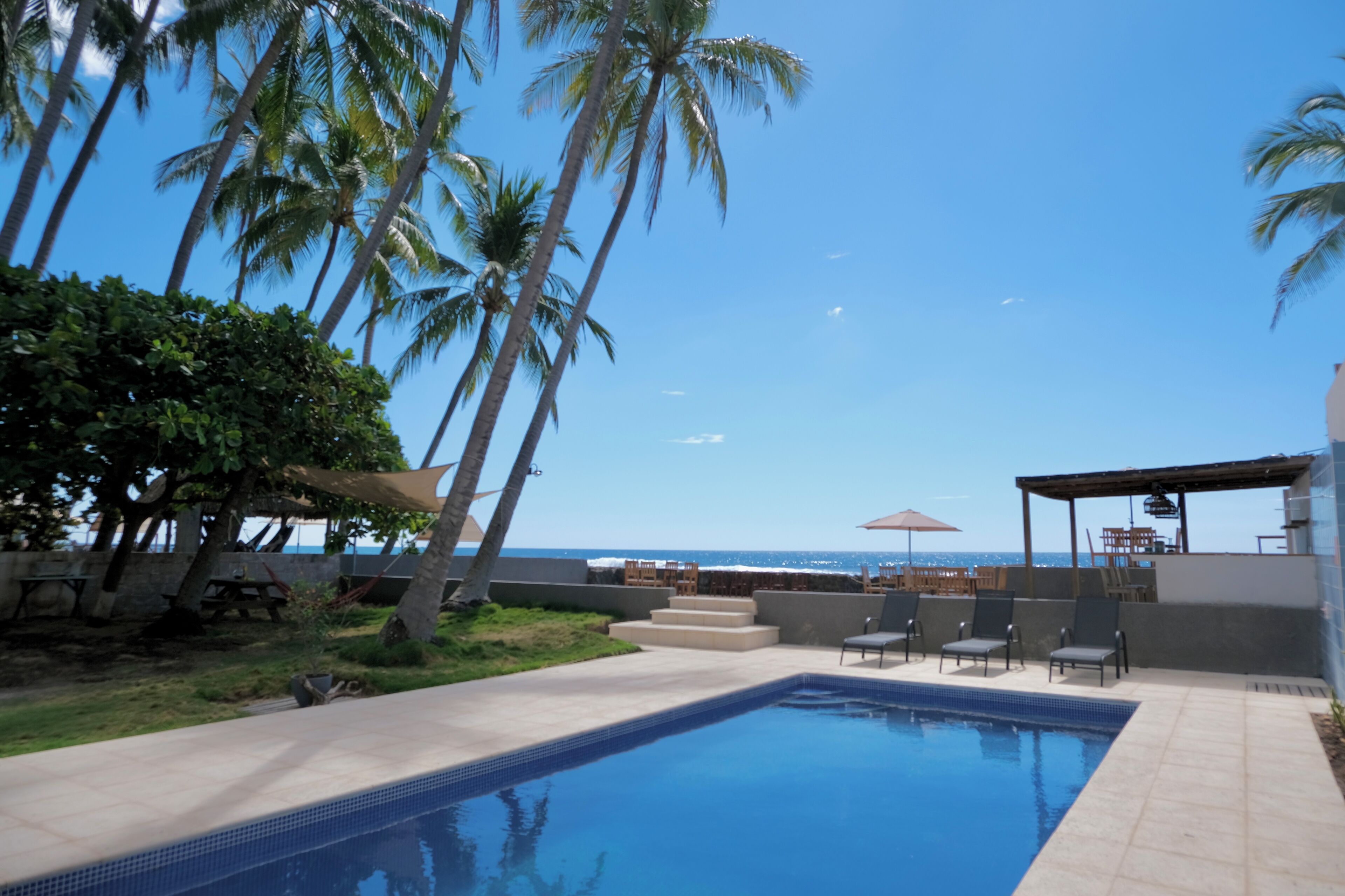 Outdoor pool, open 7:00 AM to 10:00 PM, sun loungers