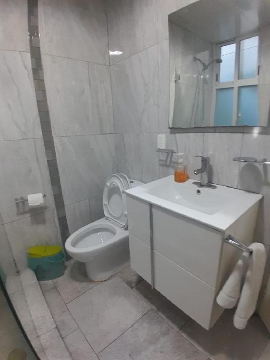 Shower, towels, soap, toilet paper