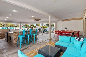 Outdoor dining - Kicks on Route 66: Scottsdale 8BR Group Haven w/ Bowling Alley & Heated Pool (Scottsdale)