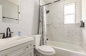 Hair dryer, towels, soap, toilet paper