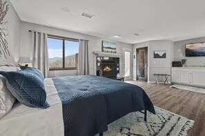 1 habitación, tabla de planchar con plancha y cuna de viaje 