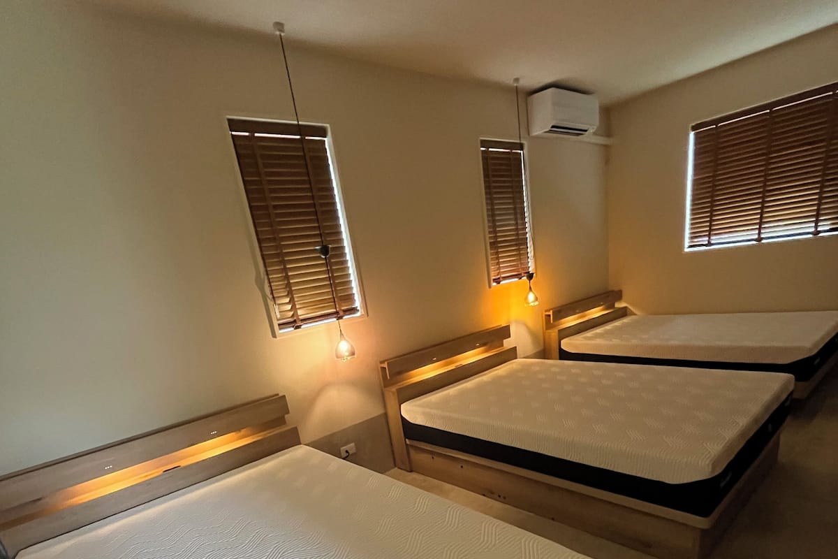 Desk, laptop workspace, blackout drapes, soundproofing