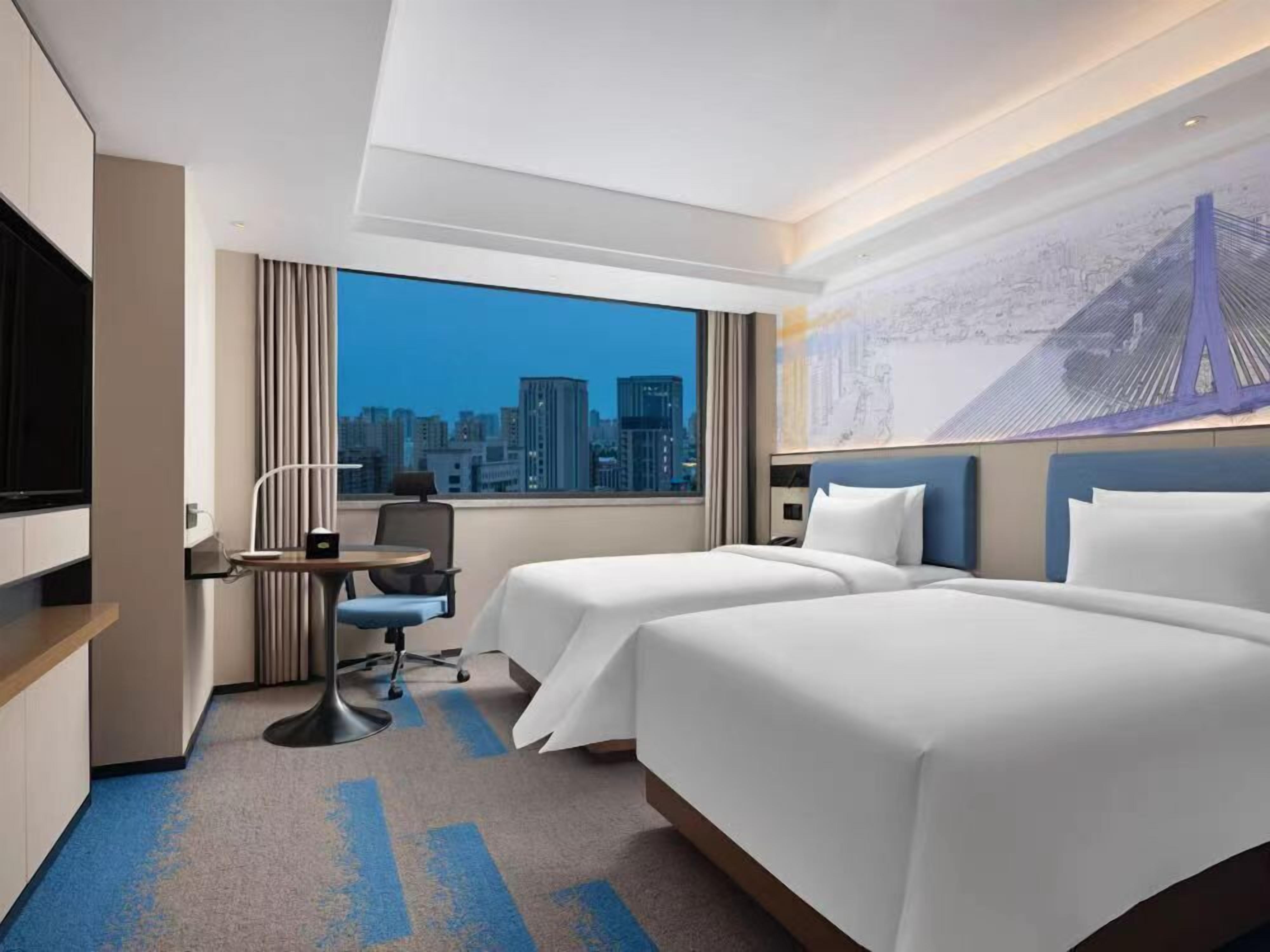 Desk, laptop workspace, free WiFi, bed sheets
