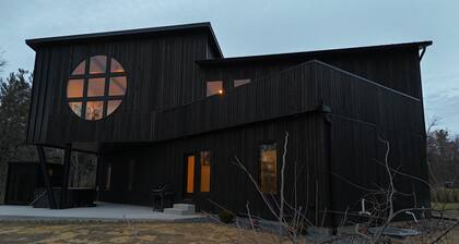 The Overhang · Luxury River Retreat with Sauna, Hot Tub, Movie Theater, & Arcade