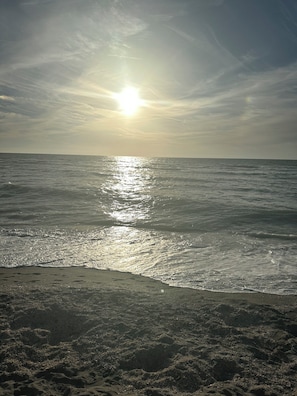 A beach with the sun reflecting off the water. - Escape to "Warm Mineral Springs"a Place Where You Can Relax And Heal your body. (North Port)