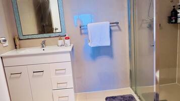 Hair dryer, towels, soap, toilet paper
