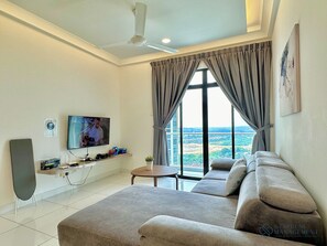 Comfort Apartment, 3 Bedrooms, Balcony, City View | Living area | Flat-screen TV - The Platino Paradigm Mall by Stayrene (Johor Bahru)