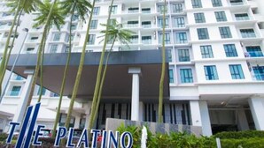 A high-rise hotel with multiple floors, a central entrance, and a fountain in the foreground. - The Platino Paradigm Mall by Stayrene (Johor Bahru)