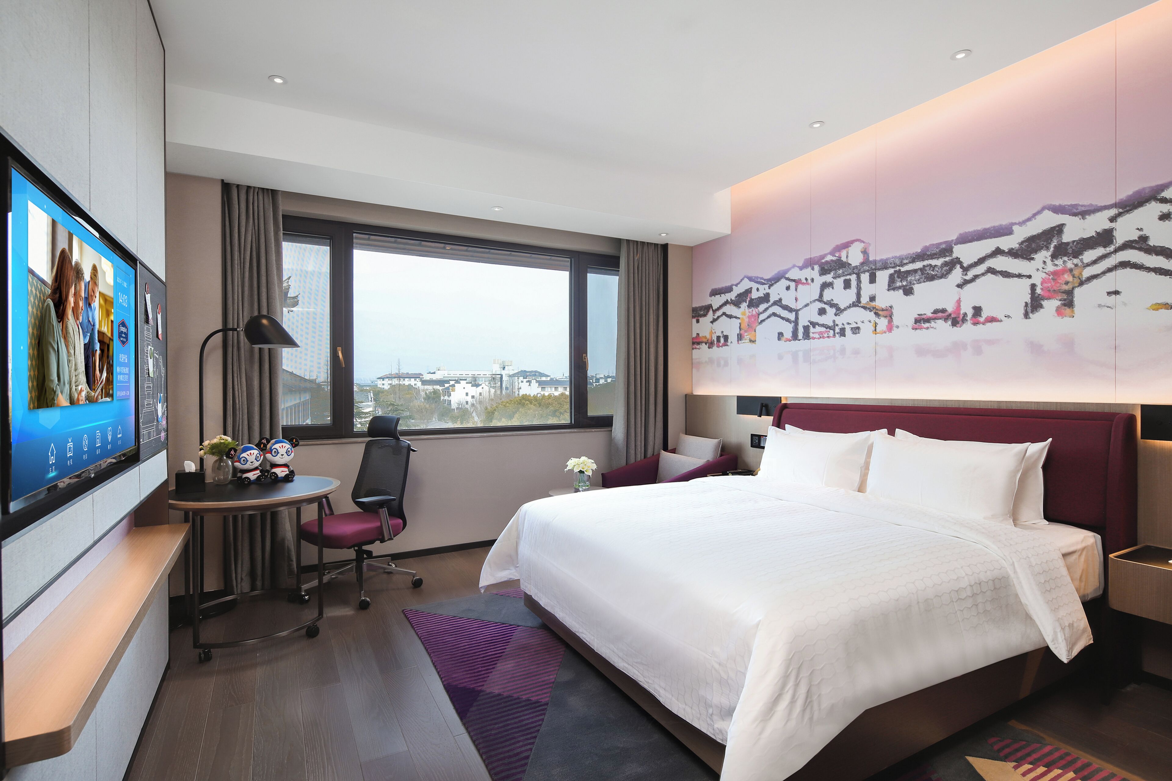 Kahden hengen comfort-huone | Ylelliset vuodevaatteet, minibaari, työpöytä