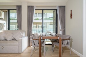 Deluxe Apartment, 2 Bedrooms, Balcony | Living area - 2 BR Apt in Gem Resort in Bangtao (Choeng Thale)