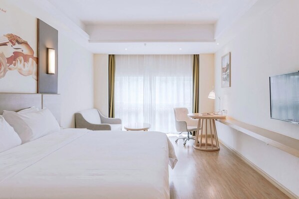 In-room safe, desk, laptop workspace, blackout drapes - Shenzhen Jinsha Resort Hotel (Shenzhen)