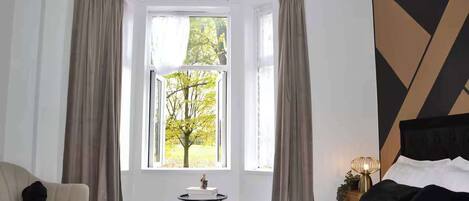 Een strijkplank/strijkijzer, wifi, rolstoeltoegang