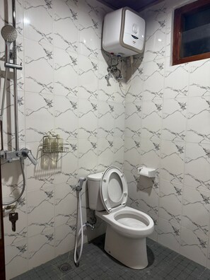 Ducha, toallas, jabón, shampoo