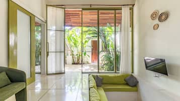 Family Villa, 2 Bedrooms, Courtyard View | Living area | 32-inch LCD TV with digital channels