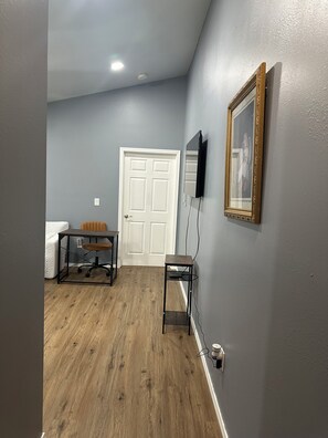 Interior - Julianna and Allan’s serene green belt view ADU with air conditioning unit. (Everett)