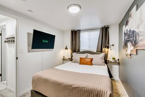 2 habitaciones, tabla de planchar con plancha y cuna de viaje 