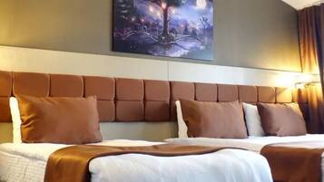 Desk, blackout drapes, soundproofing, free WiFi