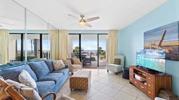 Signature Condo, 3 Bedrooms, Balcony, Beach View | Living room | 45-inch Smart TV with cable channels
