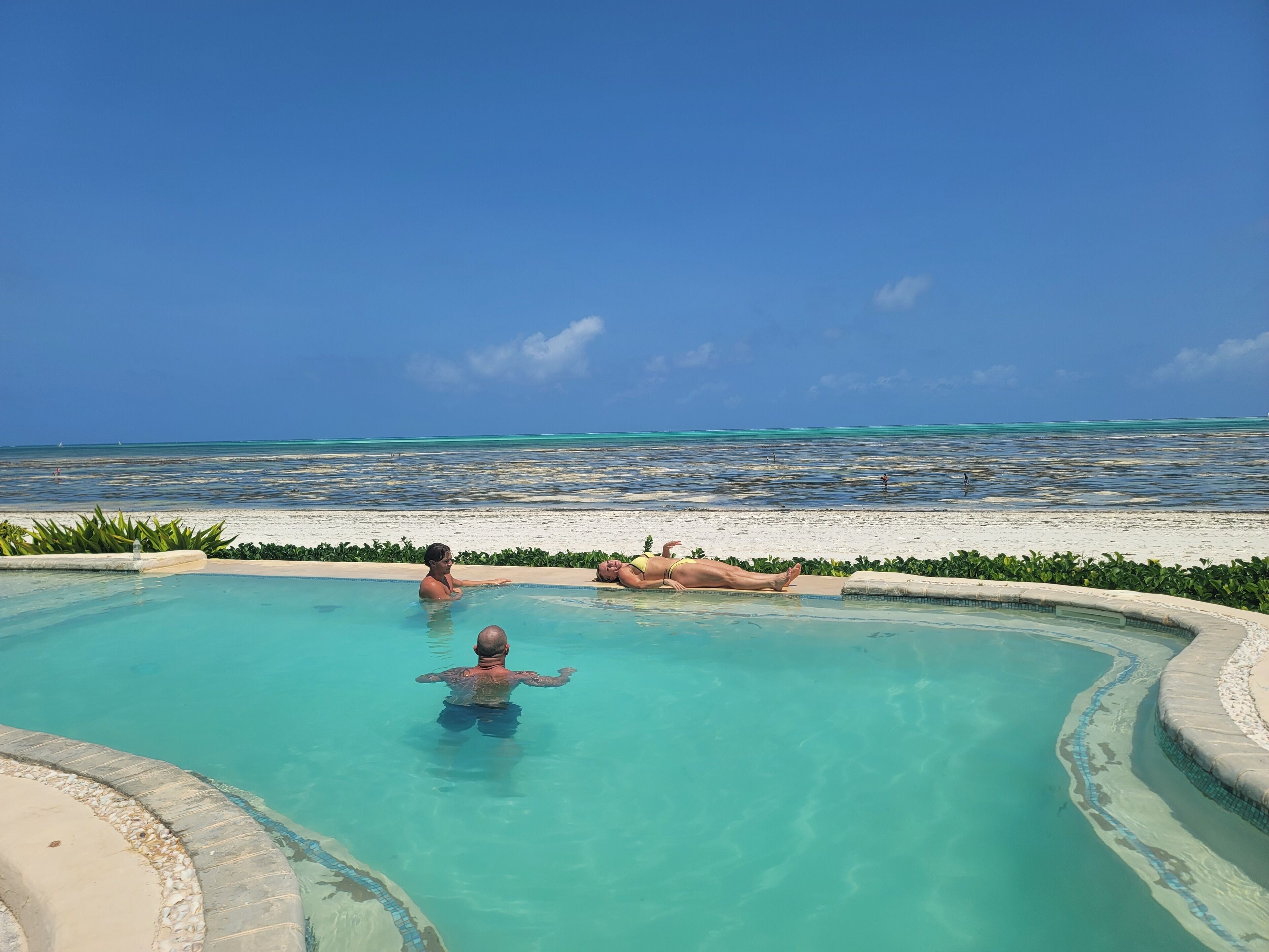 Outdoor pool, free cabanas, pool umbrellas