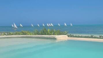 Outdoor pool, free pool cabanas, pool umbrellas