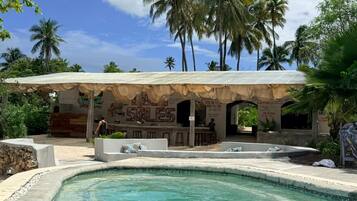 Outdoor pool, free pool cabanas, pool umbrellas