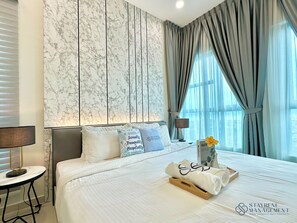 Apartamento conforto, 2 quartos, vista para a cidade | Cortinas blackout, ferros/tábuas de passar roupa, Wi-Fi de cortesia