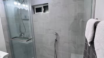 Hair dryer, towels, soap, toilet paper
