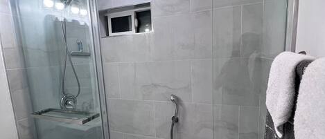 Hair dryer, towels, soap, toilet paper